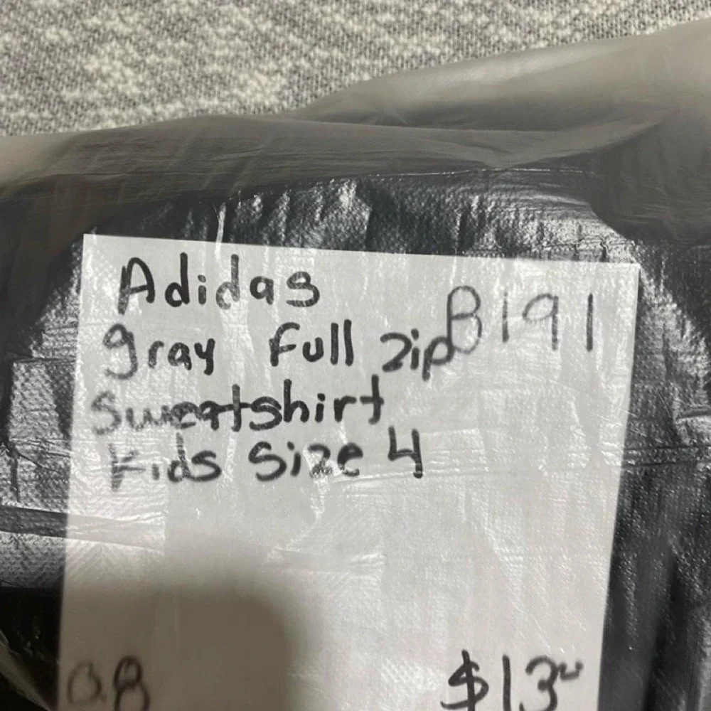 Adidas black & gray jacket with white stripes on sleeves kids size 4. SKU-B191